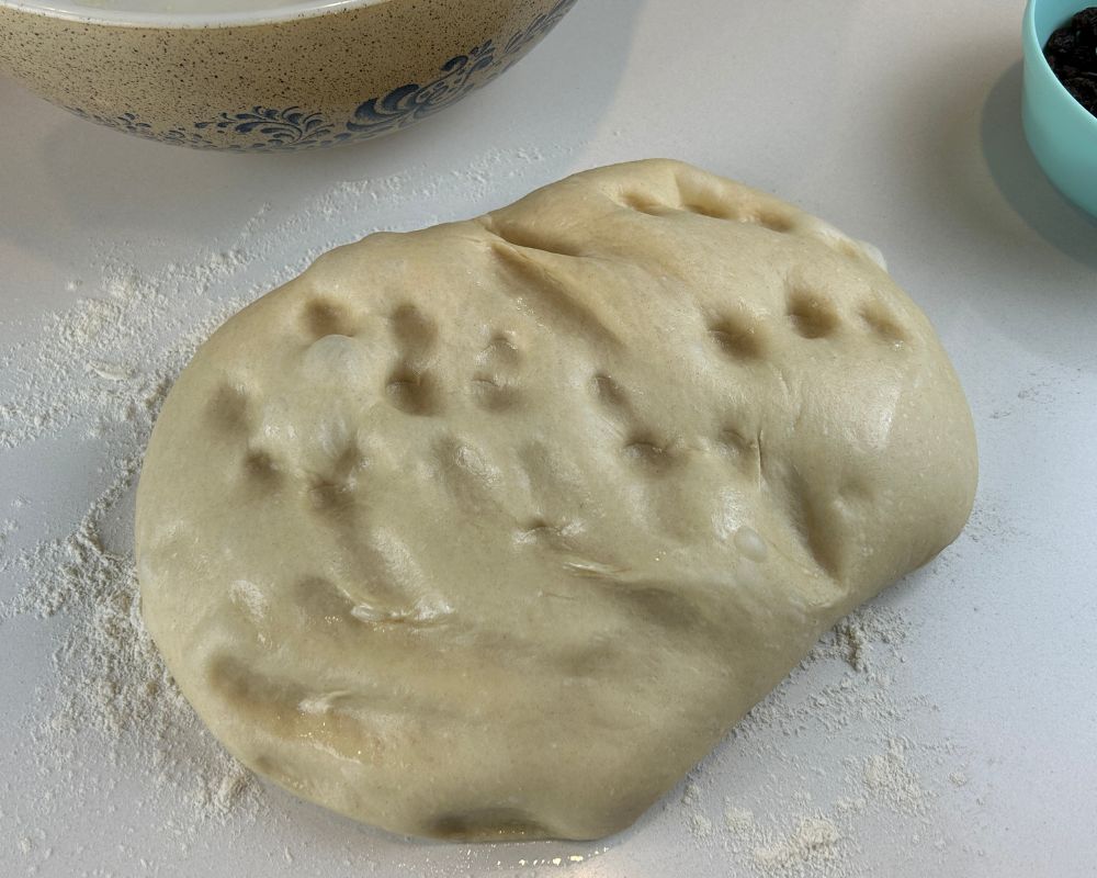 Homemade Challah dough after initial knock down. 