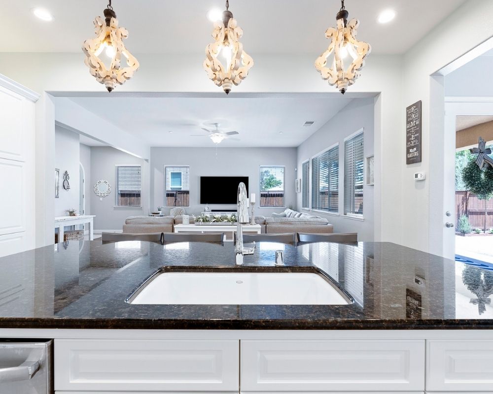 Image of kitchen island looking into living area.